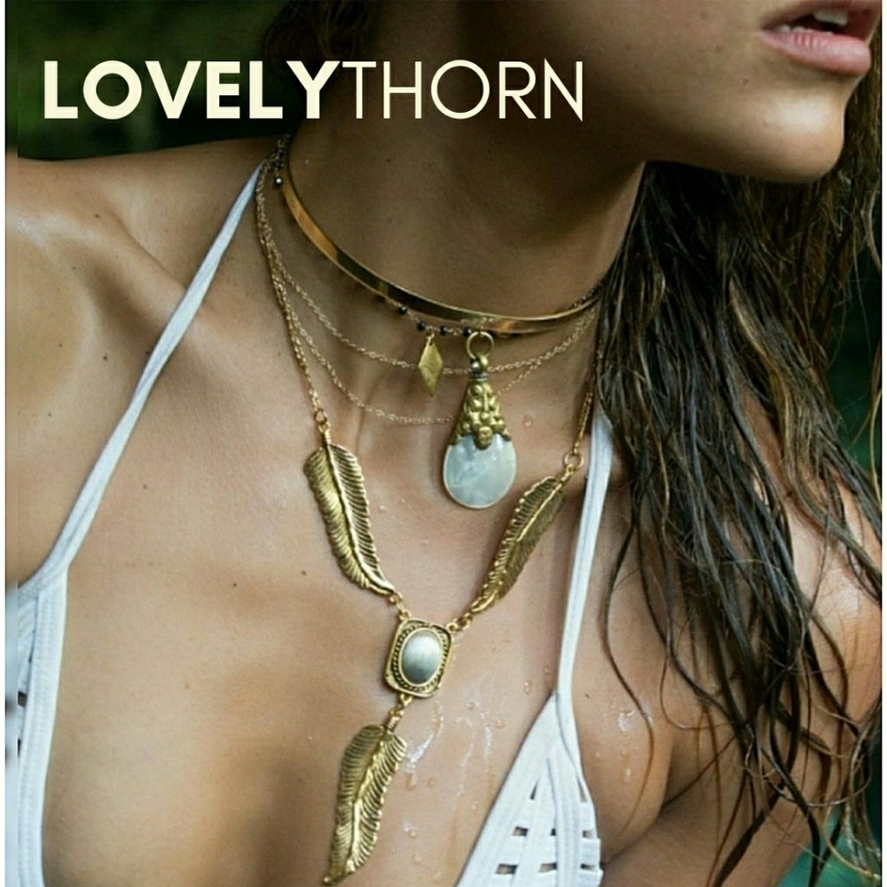 VANESSA MOONEY // ltd ed gold amiga lariat feather detail statement necklace